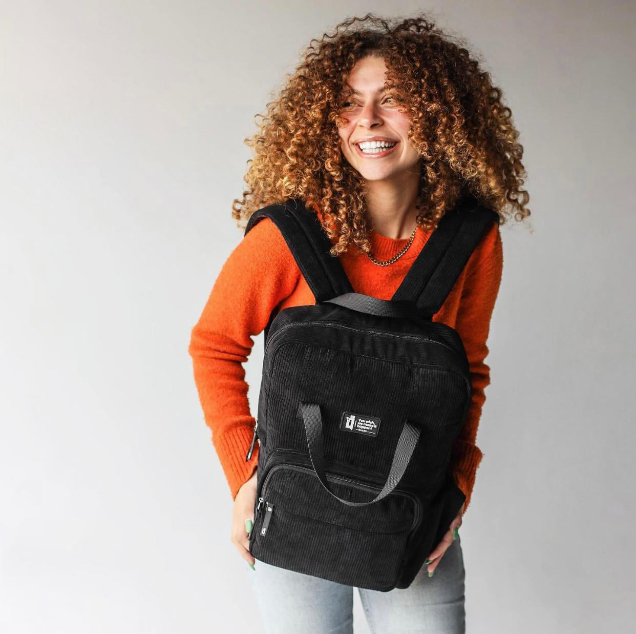 black corduroy backpack