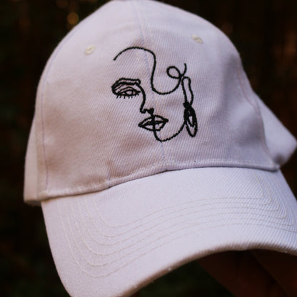 white faces cap details