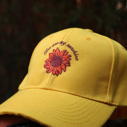 yellow flower cap front